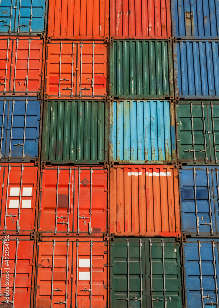 Fototapeta premium Industrial background grid of shipping containers 