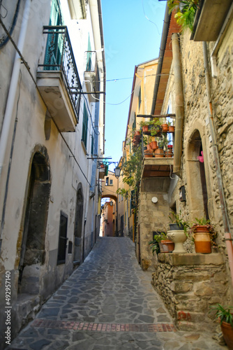 A narrow street among the old stone houses of Altavilla Silentina  town in Salerno province  Italy. 
