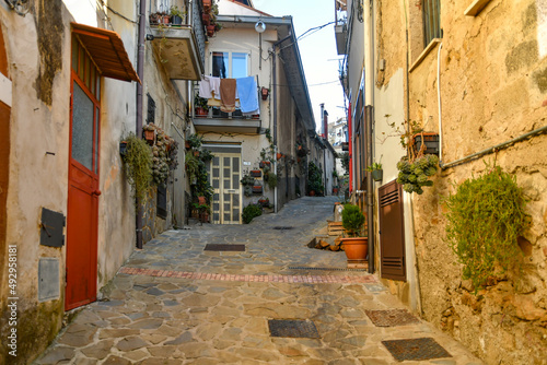 A narrow street among the old stone houses of Altavilla Silentina, town in Salerno province, Italy. 