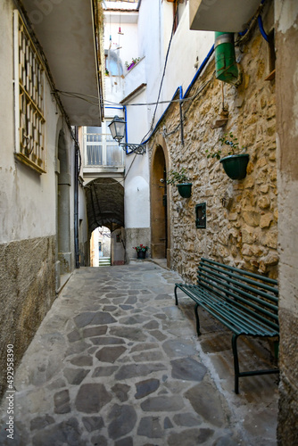 Fototapeta Naklejka Na Ścianę i Meble -  A narrow street among the old stone houses of Altavilla Silentina, town in Salerno province, Italy.	
