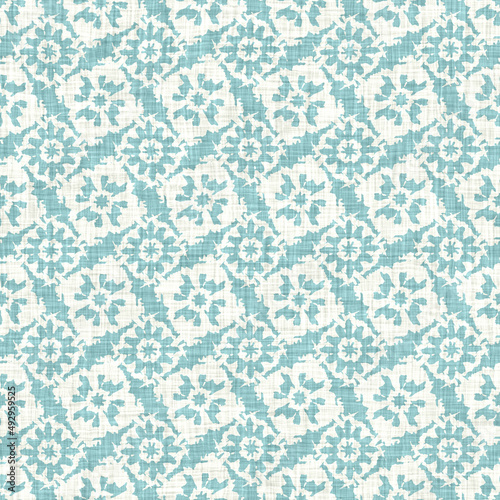 Aegean teal mottled flower linen texture background. Summer coastal living style 2 tone fabric effect. Sea green wash distressed grunge material. Decorative floral motif textile seamless pattern