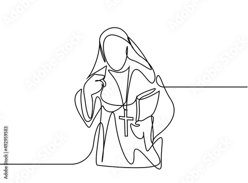 a praying person clasping hands