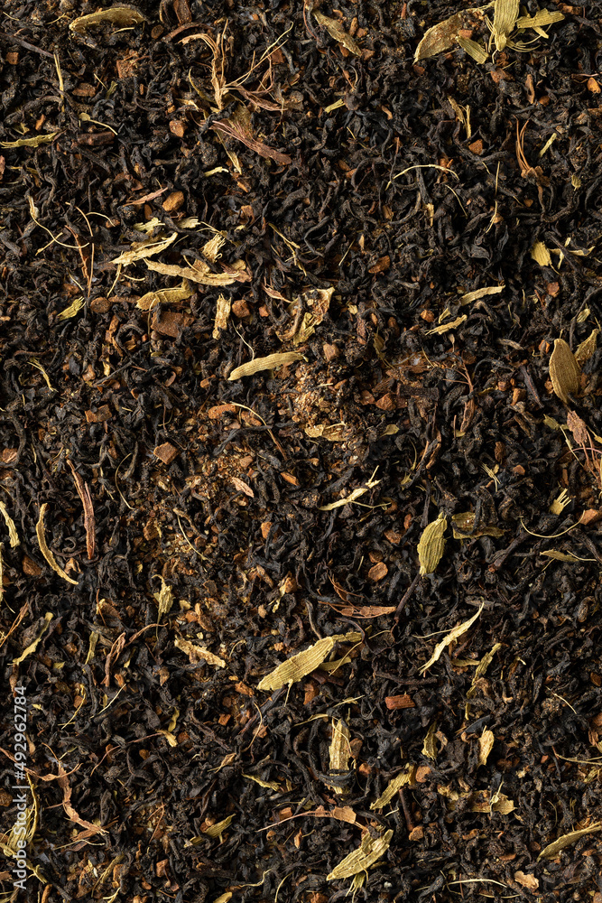 Dried chai tea mix screen filled close up Dried chai tea mix screen filled close up