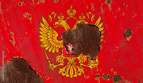 Emblem of modern Russia in state of corrosion. An abstract concept of a damaged country.
