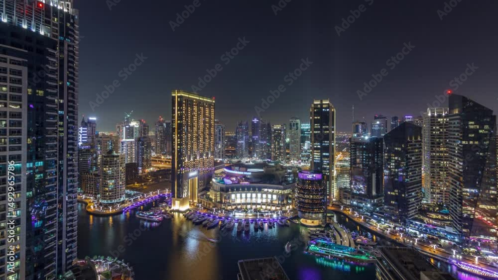 Night illumination of Dubai Marina aerial timelapse, UAE. Night illumination of Dubai Marina aerial timelapse, UAE.