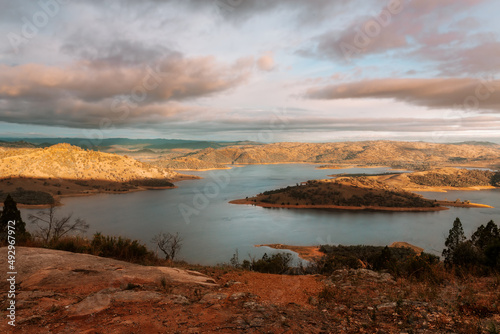 Sunlight across the hills and lake in country NSW Australia