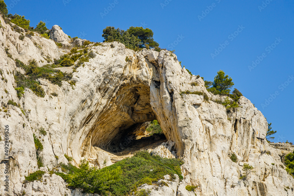 The Arch of Castel Vieil on the coast of Provence, between Cassis and Marseille in the Calanques National Park on a summer day in France