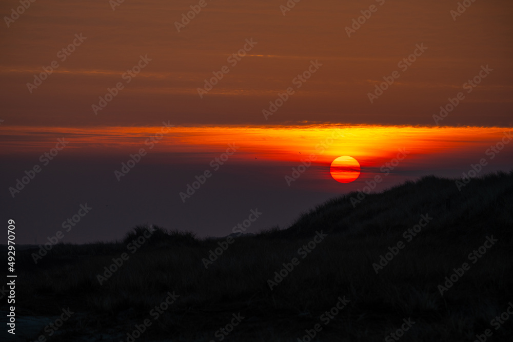 Sunrise on the island of Juist on the eastern part of the island Sunrise on the island of Juist on the eastern part of the island