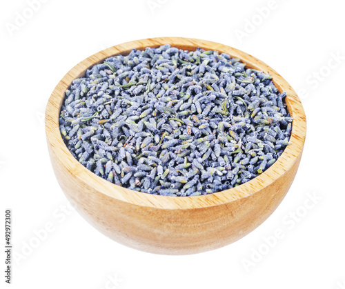 Dry lavender flowers in wooden bowl isolated on white background.
