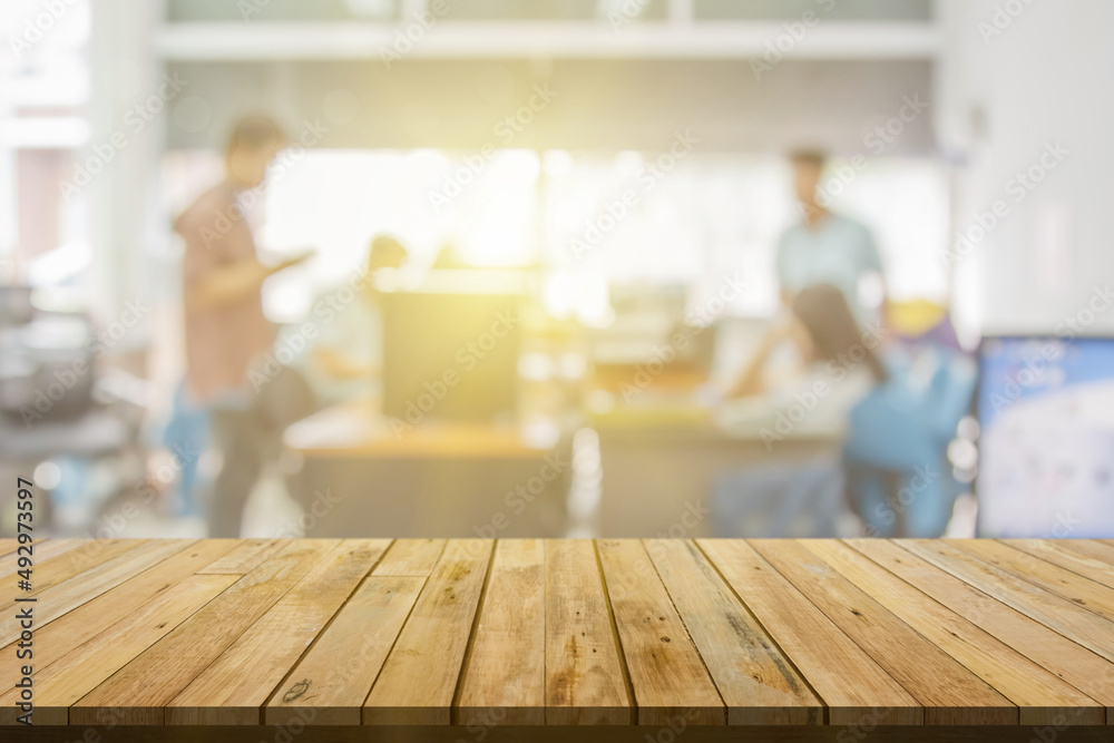 Plank wooden table top and blurred abstract background from interior ...
