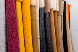 Leather fabrics obtained from natural animals, not yet processed. colored leather pieces hanging