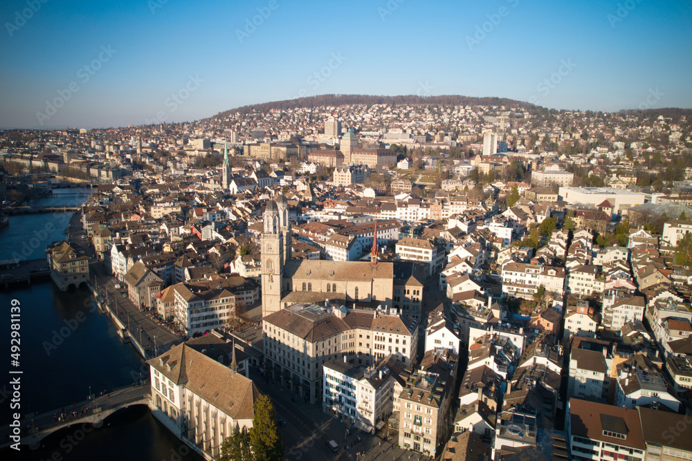 Aerial view of City of Zürich with river Limmat on a sunny spring afternoon. Photo taken March 4th, 2022, Zurich, Switzerland.