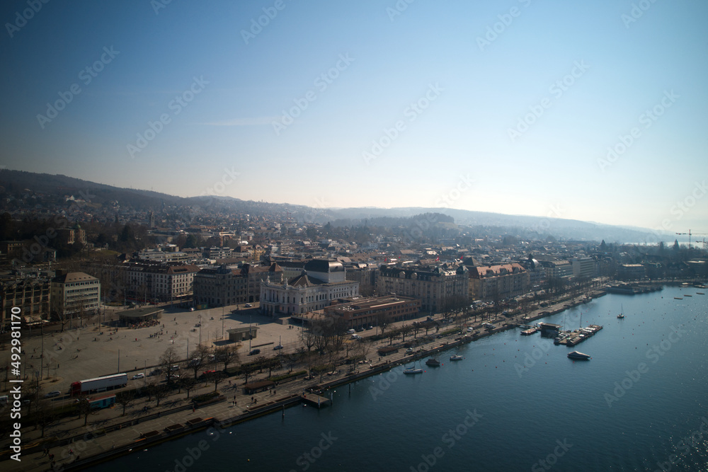 Aerial view of City of Zürich with Sechseläuten Square and opera house in the background on a sunny spring afternoon. Photo taken March 4th, 2022, Zurich, Switzerland.