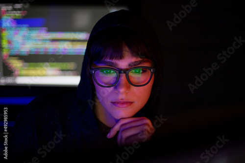 Female computer hacker in a futuristic style