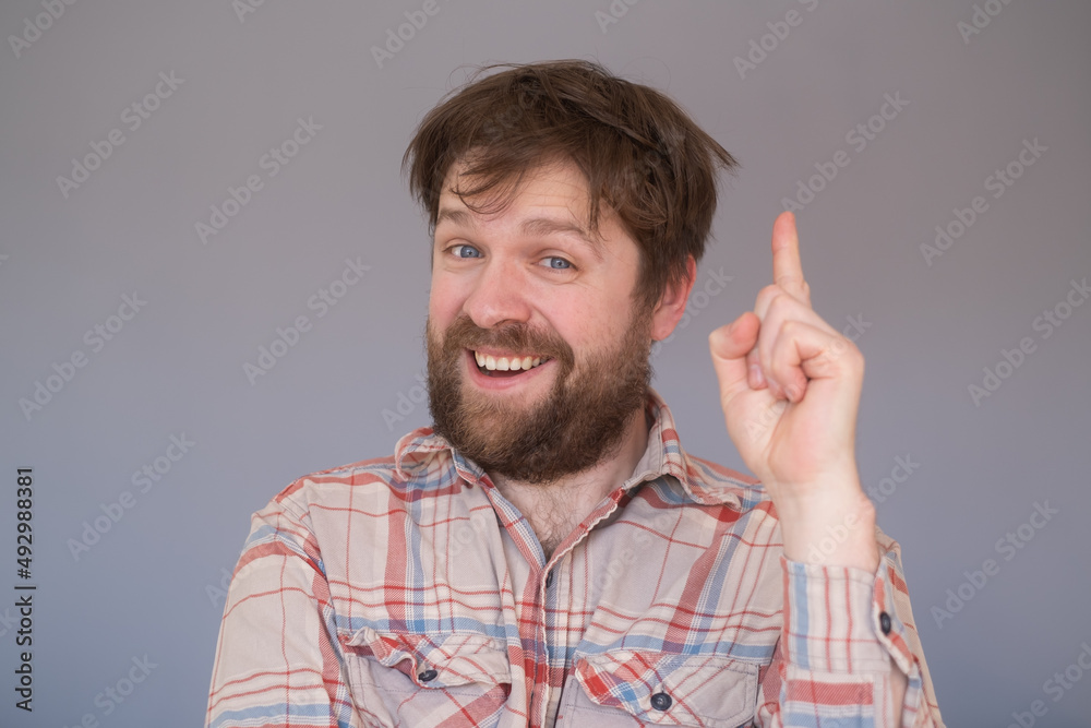 young man thinking about things generating ide young man thinking about things generating ide