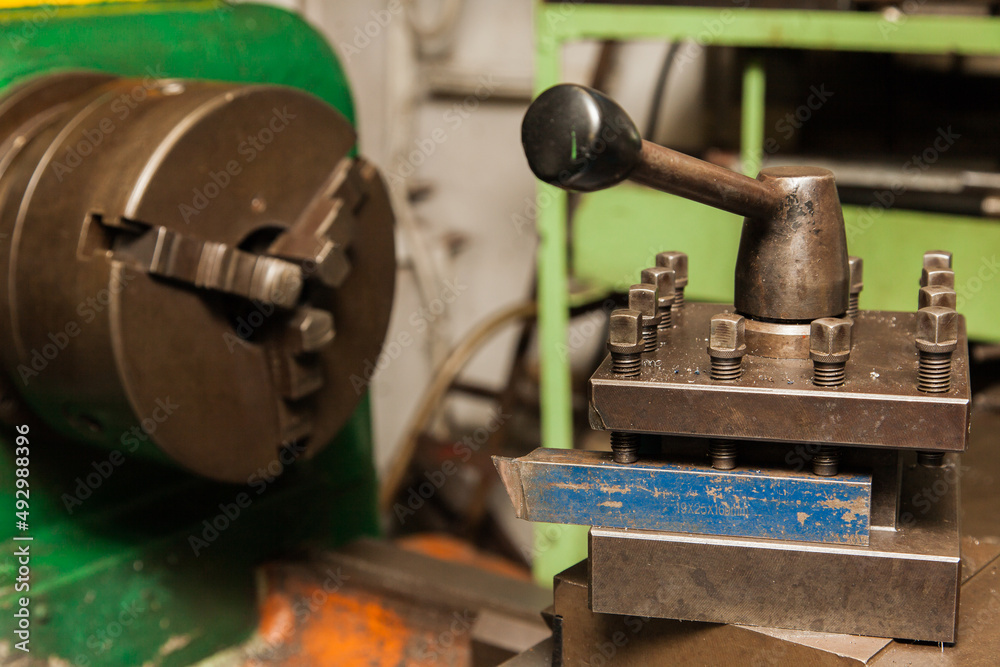 Lathe in a working workshop close-up.