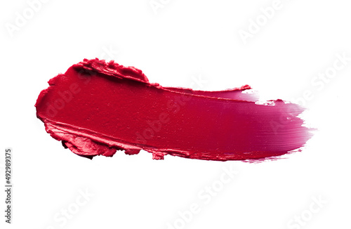 Red vinous burgundy lipstick isolated on white background texture smudged