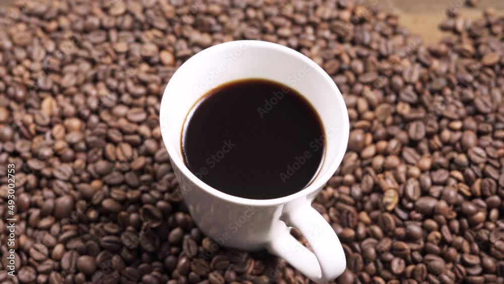 Dark roast coffee beans background, top view Dark roast coffee beans background, top view