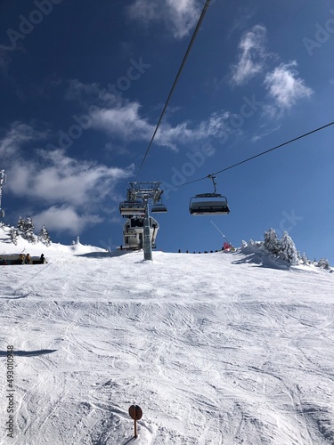 Poiana Brasov ski resort slopes on a sunny winter day