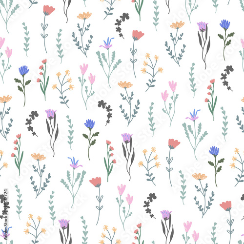 Seamless pattern of flowers painted in boho style. Vector illustration.