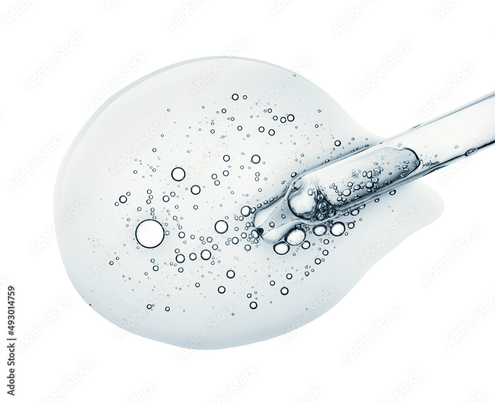 Liquid gray transparent gel or serum with dropper pipette on white isolated background Liquid gray transparent gel or serum with dropper pipette on white isolated background