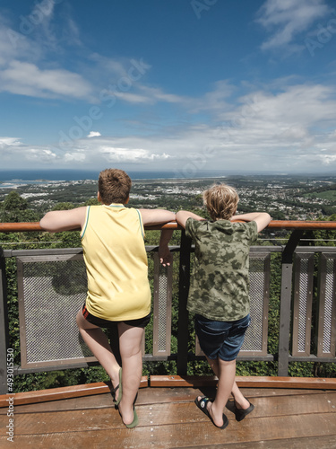 Brothers enjoying the view from Forest Sky Pier at Sealy Lookout, Coffs Harbour Australia photo