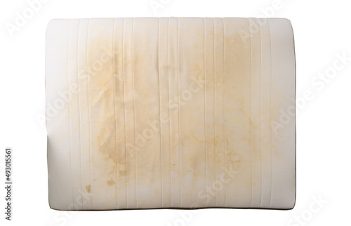 an old mattress with yellow spots and streaks before dry cleaning. Top view, isolated