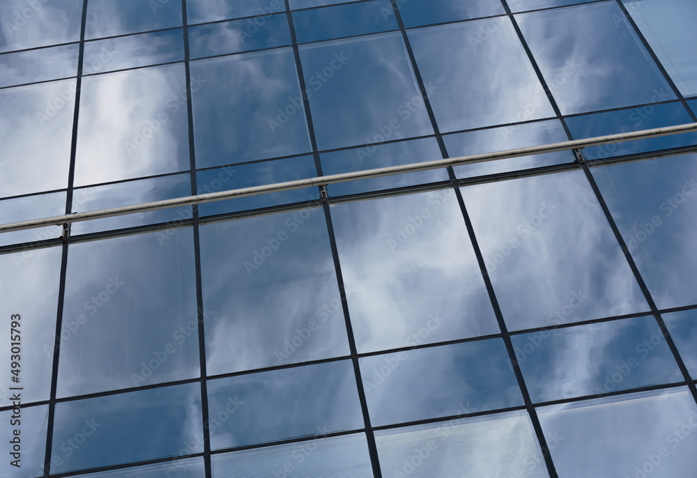 Sky colors reflecting on a oblique glass wall Sky colors reflecting on a oblique glass wall