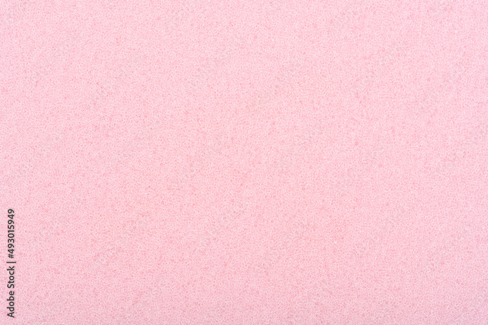 Closeup of pink cleaning sponge texture Closeup of pink cleaning sponge texture