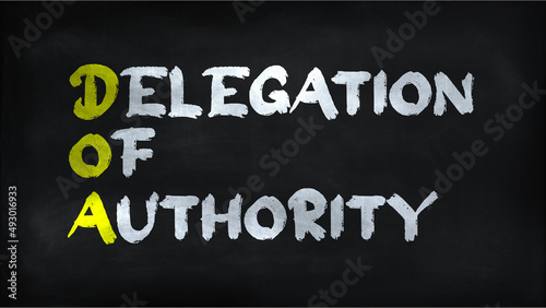 DELEGATION OF AUTHORITY (DOA) on chalkboard