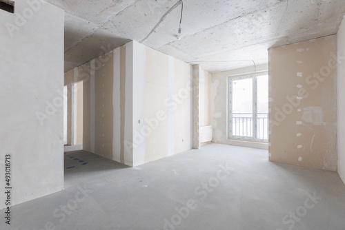 interior of the apartment without decoration in gray colors © gluschenkoart