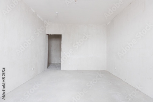 interior of the apartment without decoration in gray colors