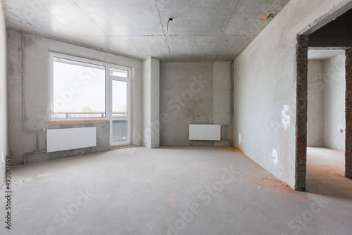 interior of the apartment without decoration in gray colors