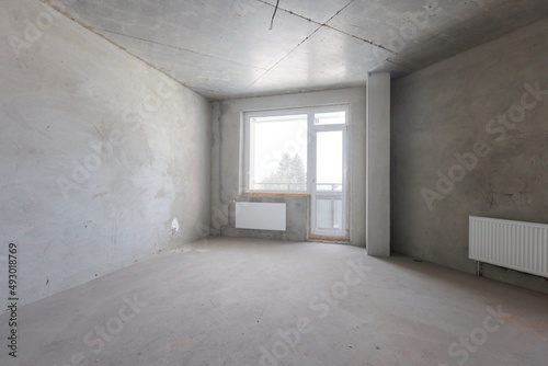 interior of the apartment without decoration in gray colors