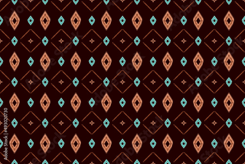 Abstract ethnic geometric ikat pattern.Tribal ethnic vector texture.Seamless pattern in aztec style.Fabric pattern mandala native textile.Embroidery design