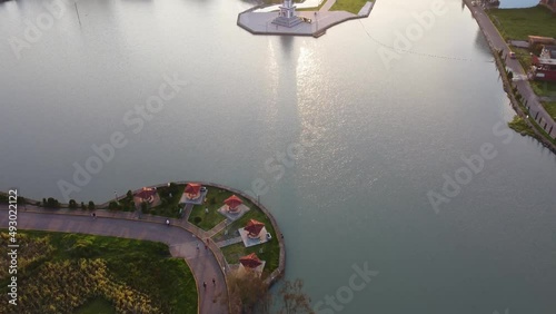 Panoramic aerial view to the coastline of Laguna Chignahuapan with yacht marinas and turquoise water photo