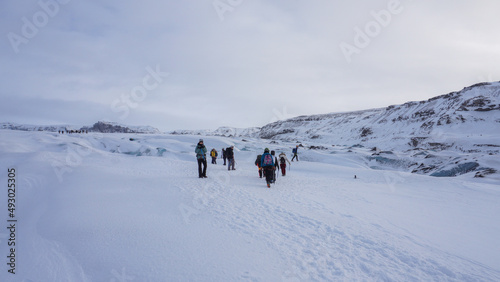 A group of people at a glacial trekking