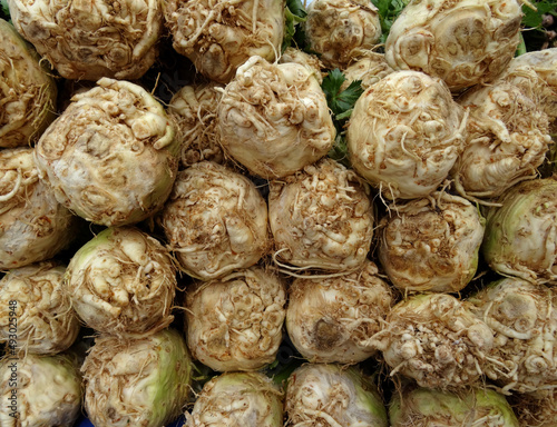 A pile of celery roots on a farmers market stall in the Aegean coastal town Yalikavak, in Bodrum, Turkey.    