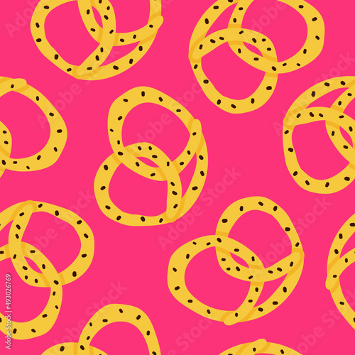Bright seamless pattern with cartoon pretzels. Traditional pretzels strewn with sesame on pink background. Design for Oktoberfest.