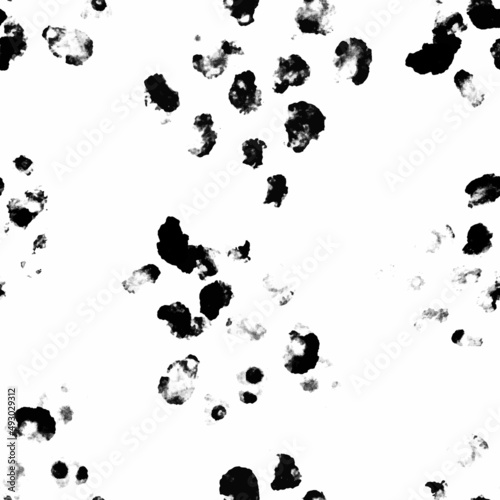 Abstract spotted seamless pattern. Dalmatian spots and leopard. Paint dirty grunge pattern. Vector hand drawn illustration isolated on white background.