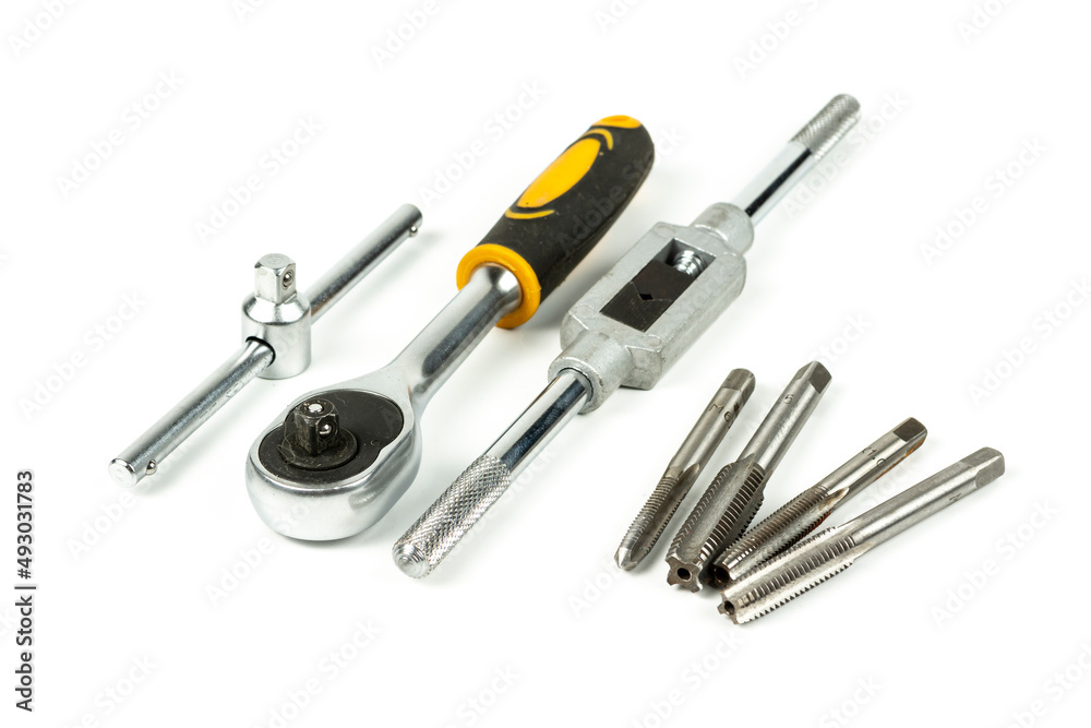 a set of professional tools for threading a hole in a repair a set of professional tools for threading a hole in a repair