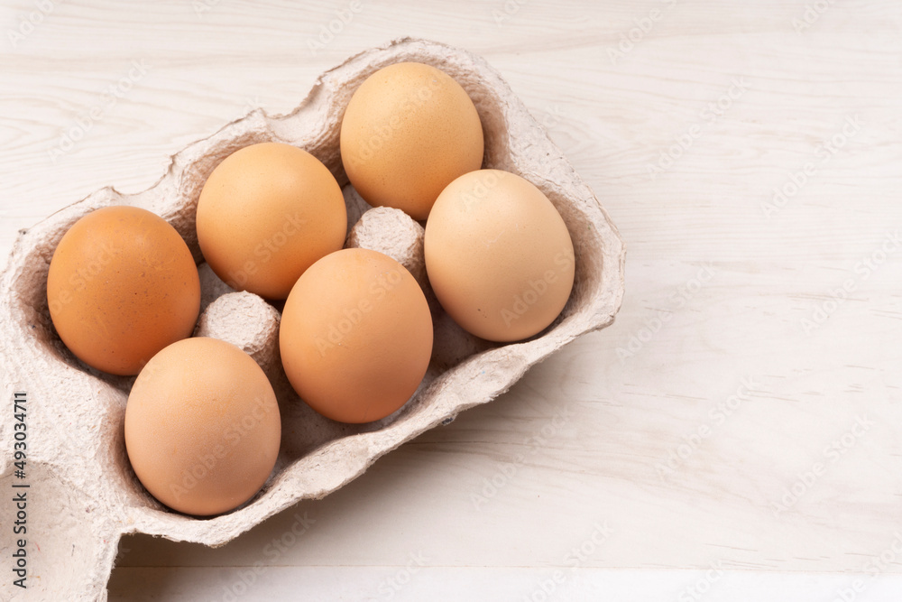 Organic chicken eggs on the table. Eggs are good for everyone and health. Farm products, natural eggs. Organic chicken eggs on the table. Eggs are good for everyone and health. Farm products, natural eggs.