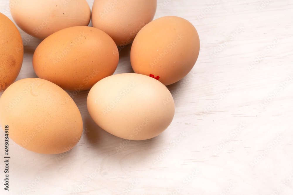 Organic chicken eggs on the table. Eggs are good for everyone and health. Farm products, natural eggs. Organic chicken eggs on the table. Eggs are good for everyone and health. Farm products, natural eggs.