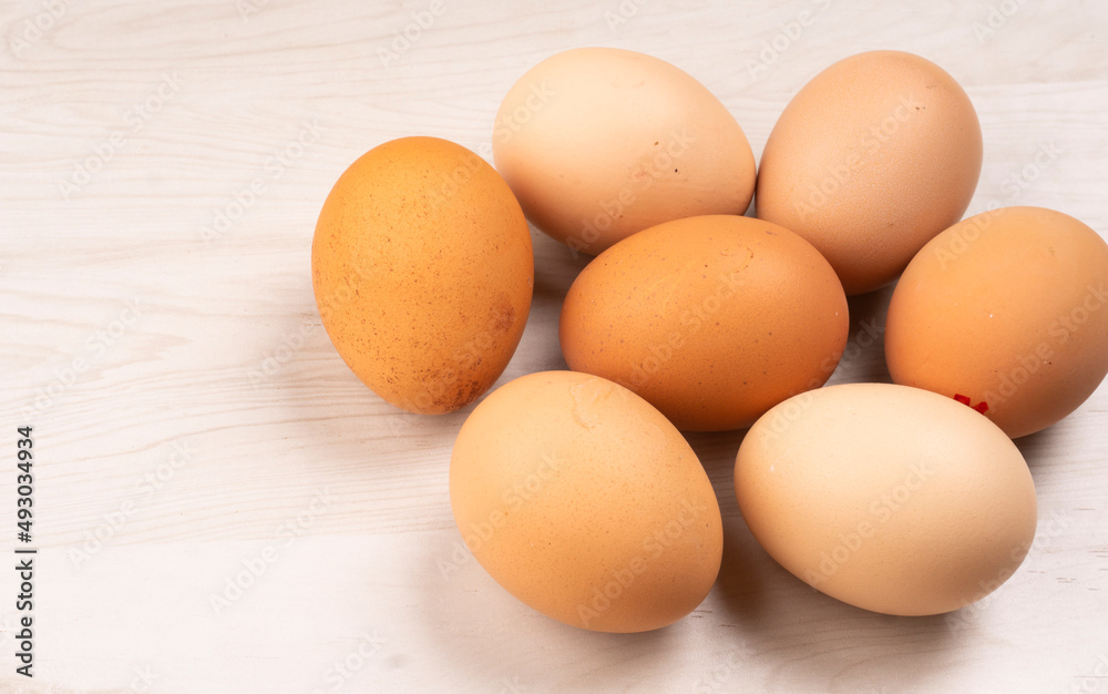 Organic chicken eggs on the table. Eggs are good for everyone and health. Farm products, natural eggs. Organic chicken eggs on the table. Eggs are good for everyone and health. Farm products, natural eggs.