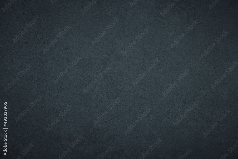 Dark gloomy blue and black slate background or texture with vignette Dark gloomy blue and black slate background or texture with vignette