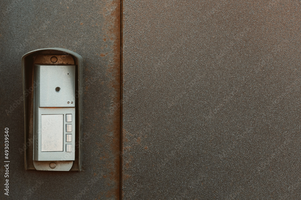 intercom doorbell on apartment building doors.