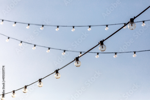 light bulbs on the background of a clear sky
