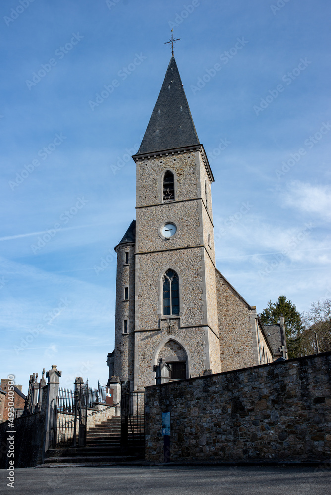Clock tower of a Gothic parish Belgian church.