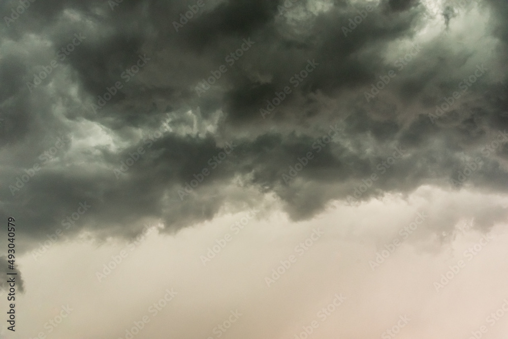 Gloomy clouds have shrouded sky before a thunderstorm Gloomy clouds have shrouded sky before a thunderstorm