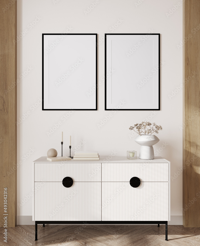Fototapeta premium 3d render of a modern mockup interior with black frames on beige wall with white sideboard and a vase with small flowers.